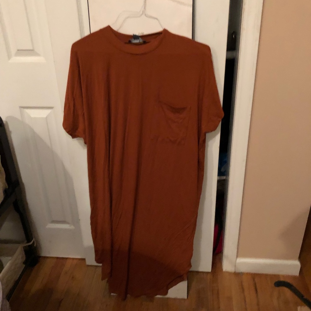Brand new never worn long rust colored sweater